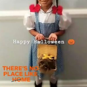 Dorthy and Toto play pretend costume